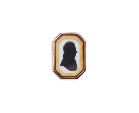 John Miers (1756-1821), a silhouette brooch, circa 1807, the silhouette on plaster composite depicting a man in profile, with