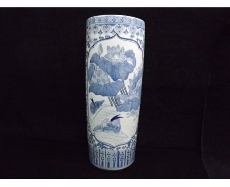 Large Chinese Stick / Umbrella Stand. 20th century Blue and White Ceramic. Decorated with a Lake scene with Grebes on one sid