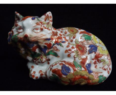 Chinese Famille Rose Cat - Pottery with White Enamel ground, overpainted flowers and buds. In colours including Iron Red and 