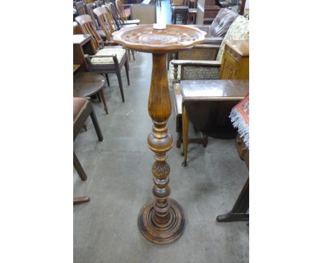 A beech lamp base converted to a jardiniere stand