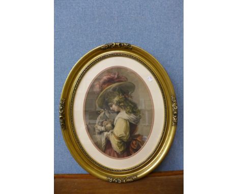 An oval print of a Victorian mother and child, framed