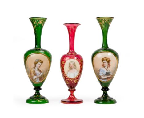 A pair of Bohemian green glass vases and a Bohemian red glass vase, late 19th century, with ovoid bodies and slender necks wi