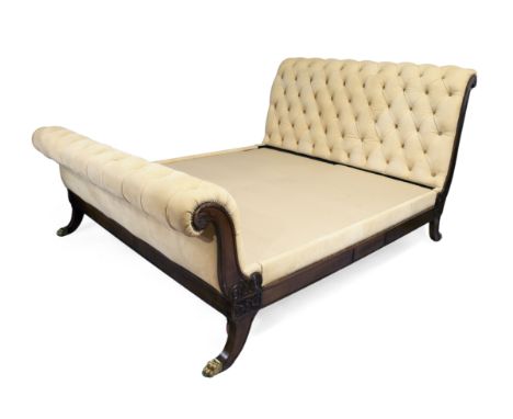 AMENDMENT: please see the updated condition report. A modern Ralph Lauren mahogany sleigh bed, of Regency style, with cream b