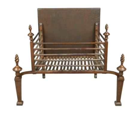An English wrought-iron fire-grate, c.1900, the rectangular railed basket and tapering standards with flame finials, 65cm hig
