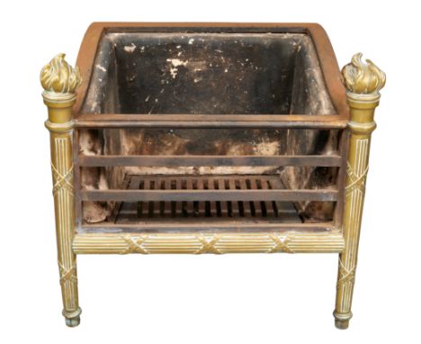 A late Victorian brass fire-grate, attributed to Thomas Elsley, late 19th / early 20th century, the standards cast as flaming