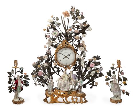 A Louis XV style ormolu-mounted and tôle peinte clock garniture, second half 19th century, the clock with white enamel dial w