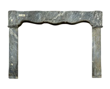 A French variegated dove grey marble chimneypiece, 19th century, the panelled frieze centred by a shell cresting, the jambs w