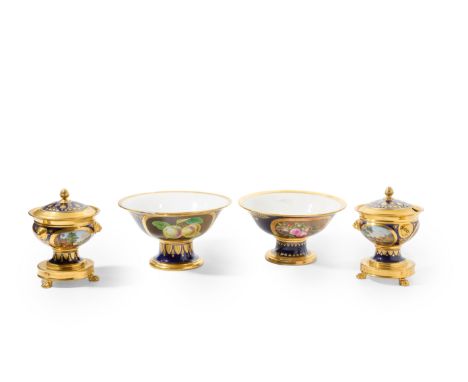 Two Paris porcelain blue-ground sauce-tureens and covers and two Paris porcelain blue-ground large footed bowls, the sauce-tu