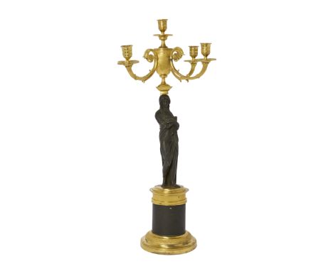 A French gilt and patinated bronze five-light candelabrum, second half 19th century, with associated elements, in the form of