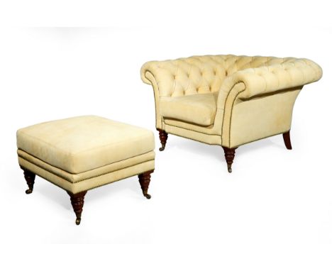 A modern Ralph Lauren chesterfield type button back armchair, upholstered in a beige suede, on turned front feet to castors, 