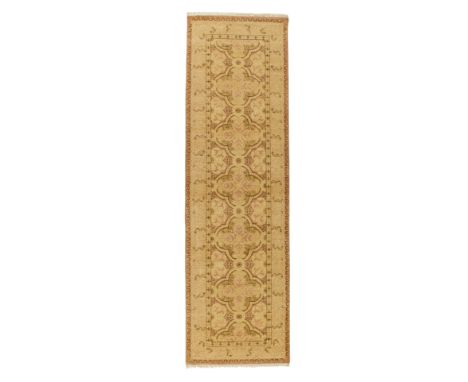 A Zeigler design runner, third quarter 20th century, the central field with repeating medallions, on a light pink and beige g