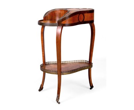 A French gilt-metal mounted kingwood pear shaped work table, of Louis XV style, second quarter 19th century, the top with thr