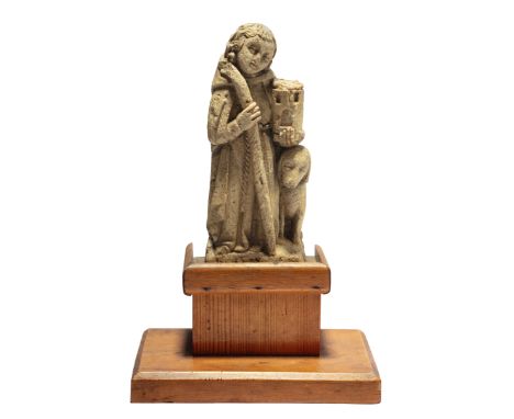 An English oolitic limestone figure of Saint Roch, 15th century, depicted in a hooded cloak holding a crook in his right hand