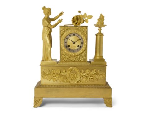 A French ormolu mantel clock, of Empire style, first half 19th century, the case with a Classical lady gesturing towards Cupi