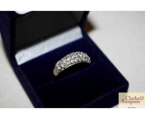 A boxed diamante ring