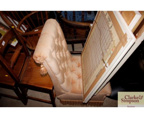 A button back upholstered nursing chair 