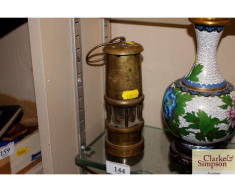 A brass miners lamp