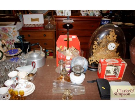 A vintage Tilley lamp; various other oil lamps and oil lamp parts including a decorative shade