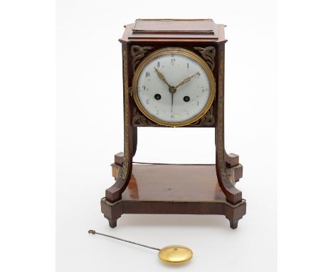 
	
		Y&nbsp;A late 19th century French rosewood and gilt metal mounted 8 day mantel clock, square case on swept uprights, pla