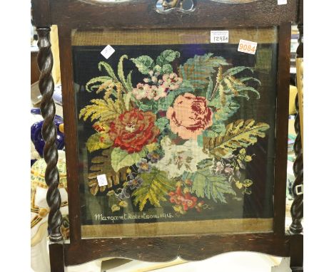 Oak fire screen with barley twist supports and flower tapestry decoration, signed Margaret Robertson 1915, H: 79 cm. Not avai