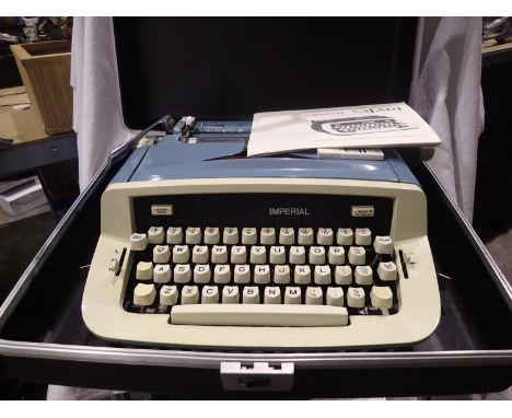 Cased Imperial Safari typewriter. Not available for in-house P&amp;P, contact Paul O'Hea at Mailboxes on 01925 659133 