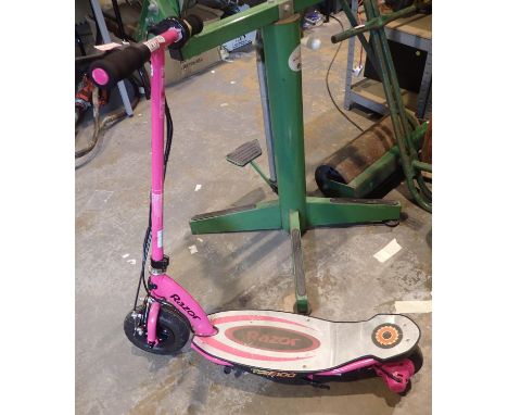 Childs pink Razor Power Core E100 scooter, lacking power supply, for 8 years plus, max weight 54kg, working at time of lottin