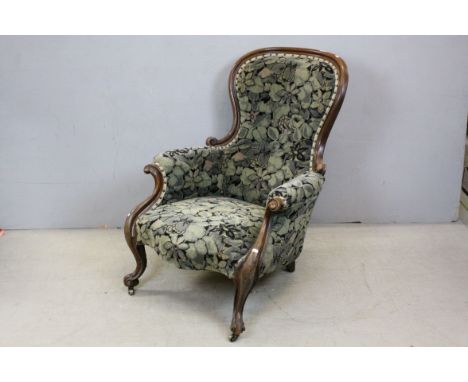Victorian Spoon Back Parlour Chair with Scroll Carved Arms and Legs terminating in Castors