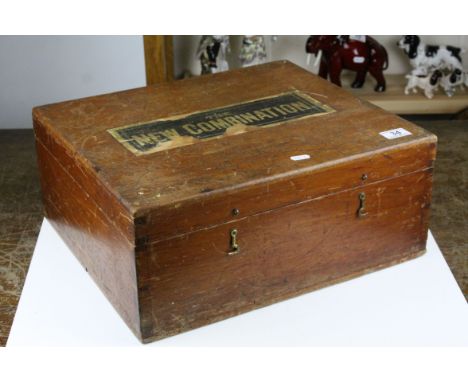 Late 19th / Early 20th century . The New Combination ' Wooden Box containing a collection of Antique Games including a Wooden