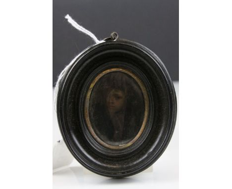 Miniature Oval Portrait Painting of a Young Georgian Boy contained within an Ebonised Oval Frame