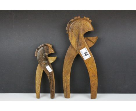 Two Vintage Scandinavian Carved Treen Nutcrackers, largest 31cms high