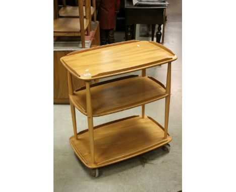 Ercol Blonde Elm Drinks / Tea Trolley with Three Shelves and raised on ball castors, 71cms wide x 78cms high