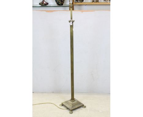Brass Corinthian Column Standard Lamp raised on Square Stepped Base and Lion Paw Feet, 134cms high