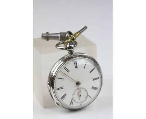 Late Victorian Silver Cased Pocket Watch, the white enamel dial with seconds hand, with key, Chester 1895