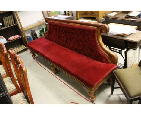 Victorian Mahogany Framed Hall Bench with Red Button Back and Seat, the shaped back with carved scroll ends, raised on turned