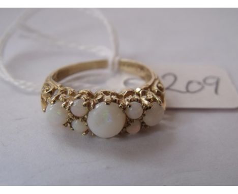 9ct ring set with seven opal stones approx size K   