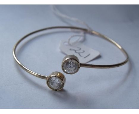 9ct torque style bangle with cubic zironian terminals  