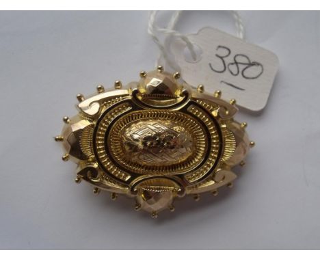An oval 9ct brooch with panel to back 4cm long   