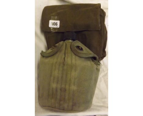 US WW2 Hand Chainsaw in pouch with handles an tools and a water bottle in carrier     