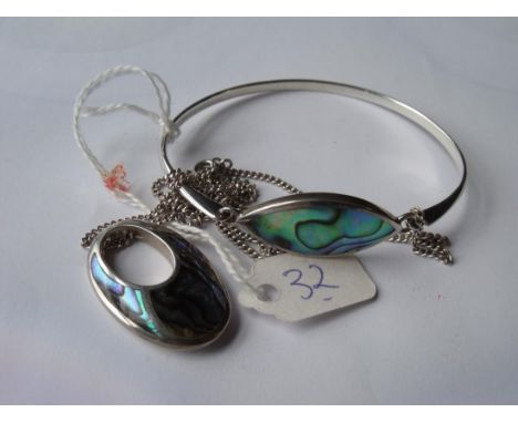 An abalone set silver pendant and silver bangle   