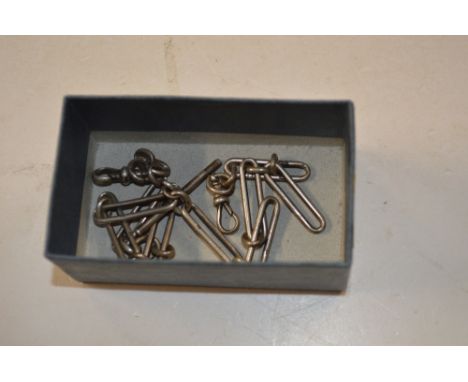 A silver pocket watch chain