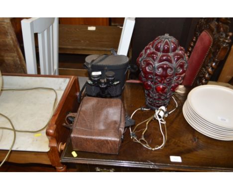 A pair of Miranda binoculars and a cased Minolta camera