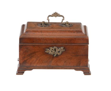  A George II mahogany tea caddy,   mid 18th century, the hinged and cavetto edged cover with foliate cast and gilt metal swin
