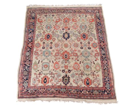  A Mahal carpet  ,  the pale field decorated with boteh and foliate motifs in tones of sky blue and madder, approximately 302