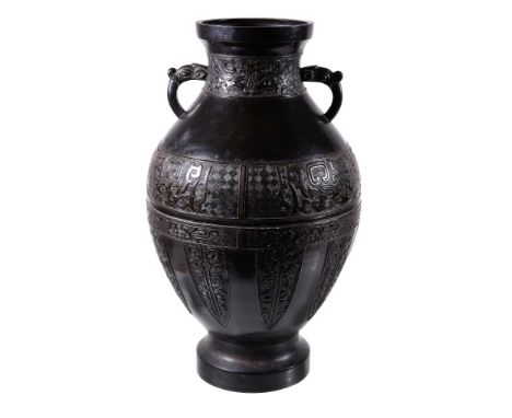  A large Chinese archaistic silver-inlaid bronze vase,     hu,   Qing Dynasty, 18th or 19th century, the pear-shaped body sup