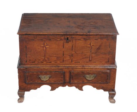  A George III oak and parquetry inlaid coffer bach,   circa 1780, the hinged lid above the star motif decorated and chevron b