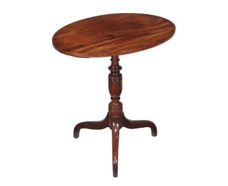  A George III mahogany oval tripod table  , circa 1790, 73cm high, the oval strung top above a turned stem and downswept legs