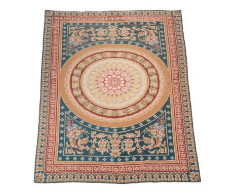  A woven tapestry panel or carpet in Savonnerie style,   20th century, with central floral motif within concentric circular b