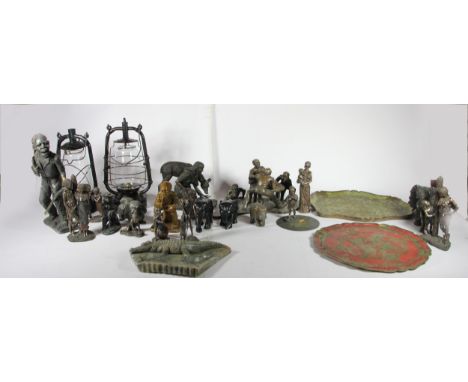 A collection of soapstone &amp; resin sculptures and figurines, together with a brass model of a Indian elephant, a plated mo