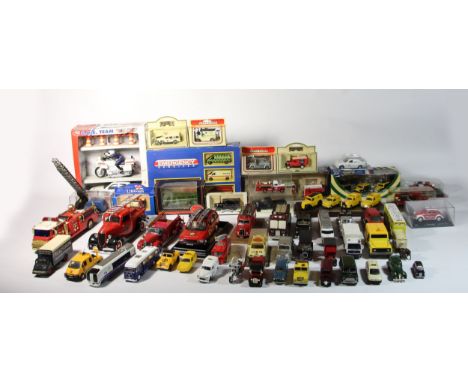 A collection of diecast and other emergency services models, makers to include - Corgi, Gilbow and Ertl. (2) 