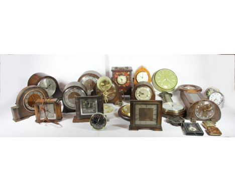 A collection of mid 20th Century clocks and barometers, to include - Westminster chime mantel clocks, alarm/travel clocks and